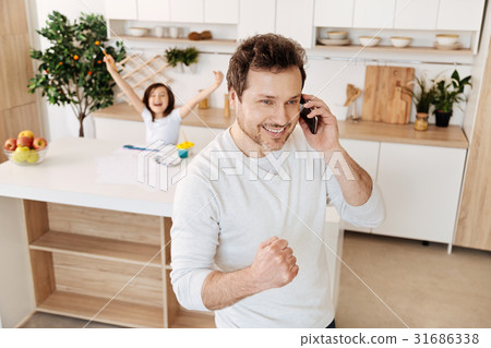Father and daughter receiving great news Father and daughter receiving great news 31686338