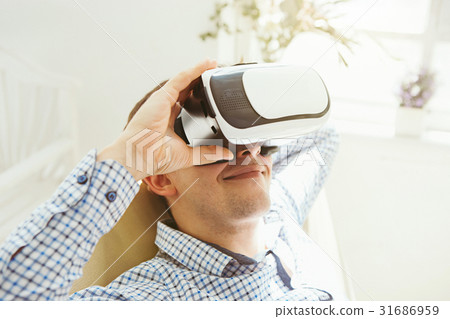 The man with glasses of virtual reality. Future 31686959