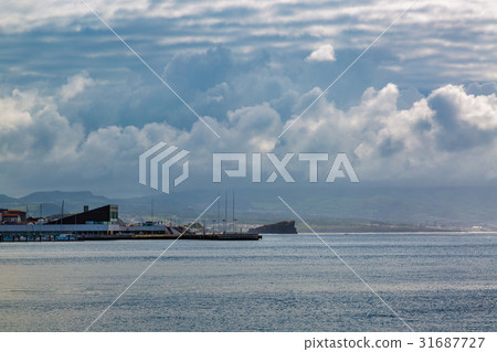 Seafront Ponta Delgada with the port. 31687727