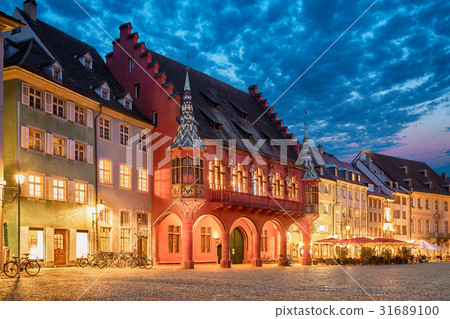 Historical Merchants Hall at dusk in Freiburg Historical Merchants Hall at dusk in Freiburg 31689100