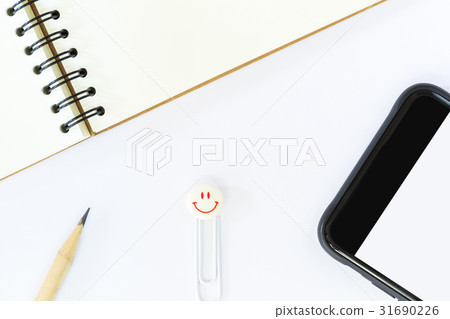 stationary and smart phone on white background stationary and smart phone on white background 31690226