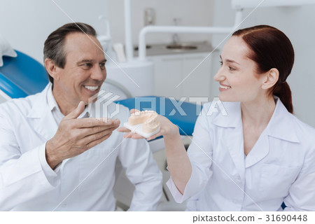 Portrait of positive coworkers while discussing Portrait of positive coworkers while discussing 31690448