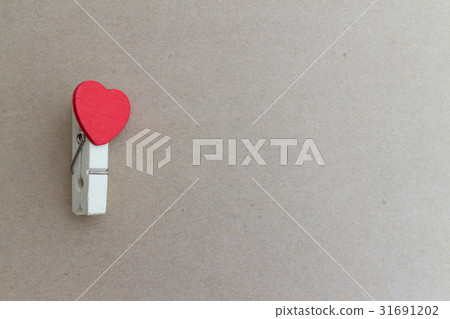 clothespin with heart shape design and brown paper clothespin with heart shape design and brown paper 31691202