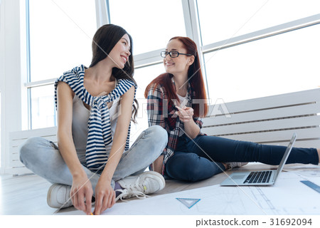 Happy positive women looking at each other 31692094