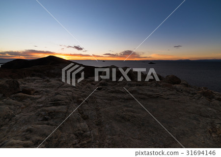 Sunset light on the Island of the Sun 31694146