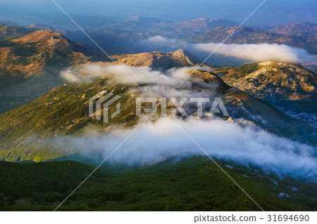 Lovcen Mountains park at sunset - Montenegro Lovcen Mountains park at sunset - Montenegro 31694690