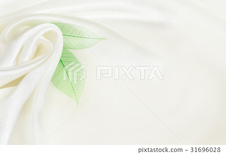 White silk background with flower drapery White silk background with flower drapery 31696028
