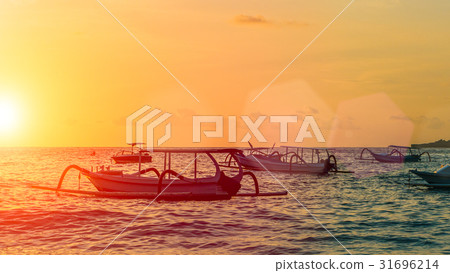 Sunset with boats in the foreground, Nusa Penida Sunset with boats in the foreground, Nusa Penida 31696214