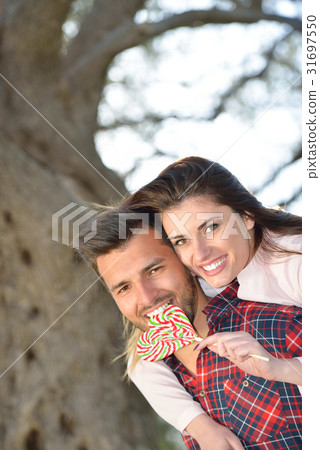 couple relax under the tree. Fine art style. Olive 31697550