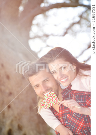 couple relax under the tree. Fine art style. Olive couple relax under the tree. Fine art style. Olive 31697551