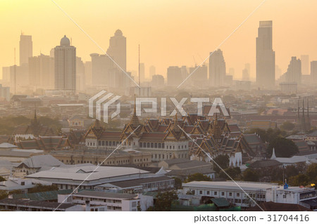 Golden grand palace of bangkok with skyscraper Golden grand palace of bangkok with skyscraper 31704416