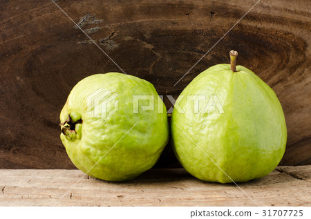 Guava fruit on wooden background,Healthy fruit Guava fruit on wooden background,Healthy fruit 31707725