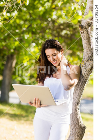 Happy woman using laptop Happy woman using laptop 31708254