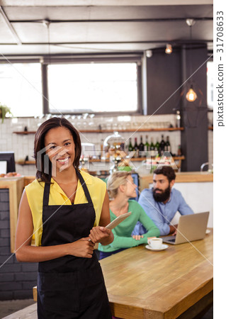 Waitress holding a tablet Waitress holding a tablet 31708633