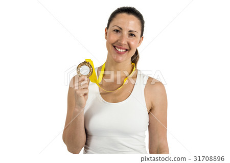 Female athlete posing with gold medals after victory Female athlete posing with gold medals after victory 31708896