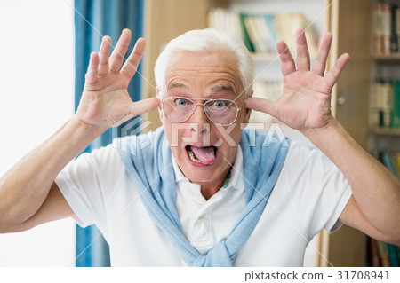 Senior man making faces Senior man making faces 31708941