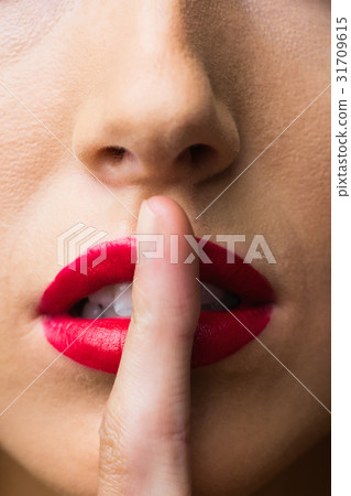 Close up of lips with makeup on them Close up of lips with makeup on them 31709615