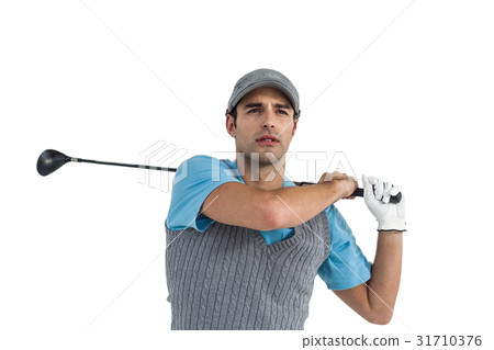 Golf player taking a shot 31710376