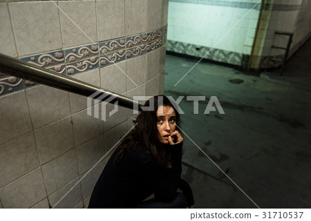 Adult Woman Sitting Look Worried on The Stairway 31710537