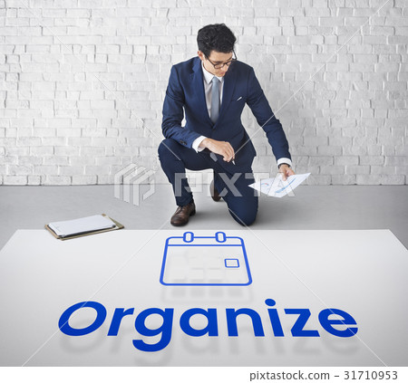 Man planning with illustration of personal organizer calendar Man planning with illustration of personal organizer calendar 31710953
