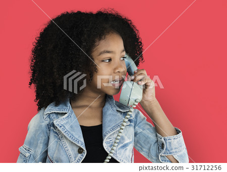 Little Girl Talking on the Phone Communication Studio Portrait Little Girl Talking on the Phone Communication Studio Portrait 31712256