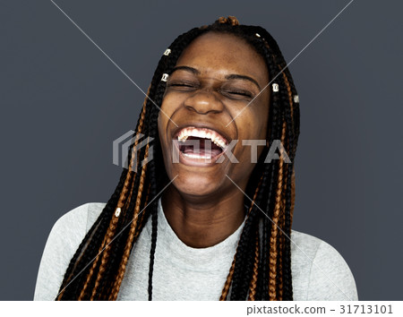 African Girl smiling casual studio portrait 31713101