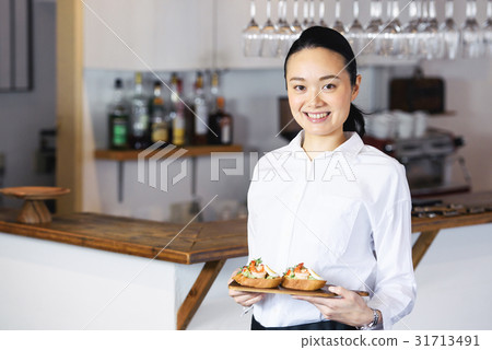 A young cafe clerk A young cafe clerk 31713491