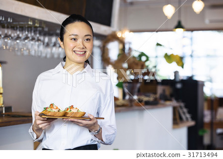 A young cafe clerk 31713494