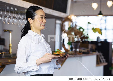 A young cafe clerk A young cafe clerk 31713495