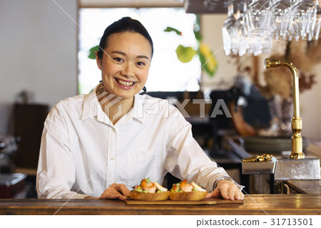A young cafe clerk A young cafe clerk 31713501