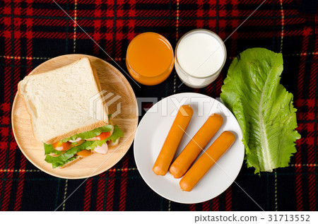 Sandwich,sausage and juice,Breakfast 31713552