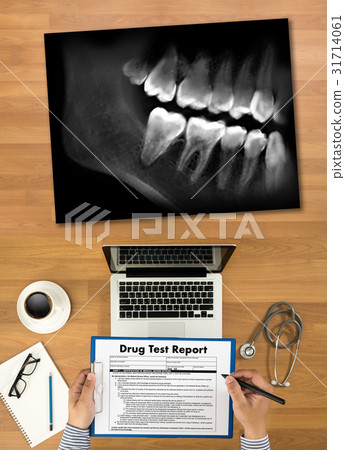 Dental x-ray Doctor holding and looking and Dental x-ray Doctor holding and looking and 31714061