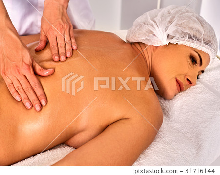 Massage woman therapist making manual therapy back 31716144