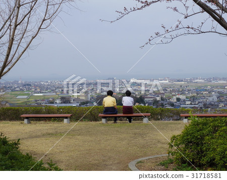 Two people watching the Matsuyama plain at the loyal sacred place Iyo Nada SA Two people watching the Matsuyama plain at the loyal sacred place Iyo Nada SA 31718581