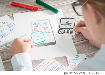 Designer drawing website ux app development. 31721513