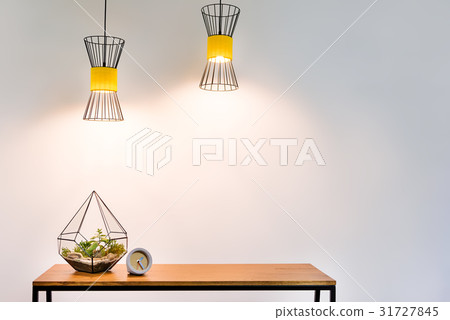 Stylish vase with domestic plant and watch on 31727845