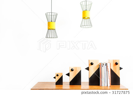 Statuettes for interior setting with pile of books Statuettes for interior setting with pile of books 31727875