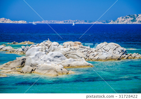 Granite rocks in sea, amazing azure water, white 31728422