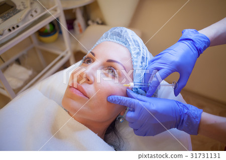 doctor beautician increases lip patient an doctor beautician increases lip patient an 31731131