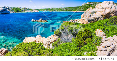 Emerald green sea water and rocks on coast of Emerald green sea water and rocks on coast of 31732073