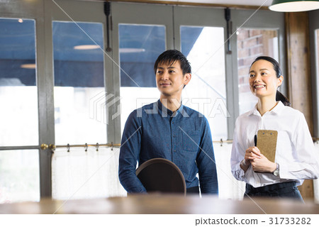 A young cafe clerk A young cafe clerk 31733282