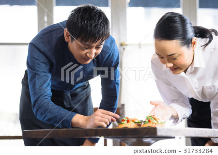 A young cafe clerk A young cafe clerk 31733284
