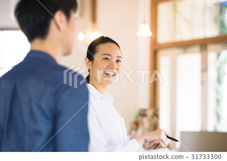 A young cafe clerk A young cafe clerk 31733300