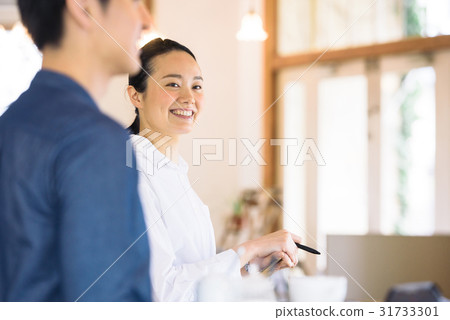 A young cafe clerk A young cafe clerk 31733301