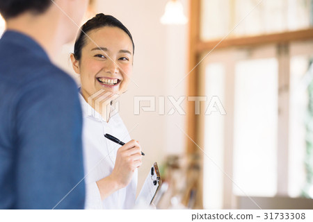 A young cafe clerk A young cafe clerk 31733308