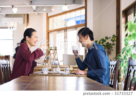 A young cafe clerk A young cafe clerk 31733327