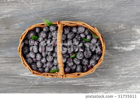 Fresh blueberries in basket old table Fresh blueberries in basket old table 31735011