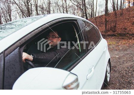 Trip by car in the autumn rainy day Trip by car in the autumn rainy day 31735063