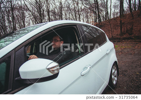 Trip by car in the autumn rainy day Trip by car in the autumn rainy day 31735064