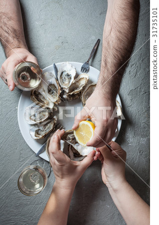 Exotic dish - oysters with wine 31735101